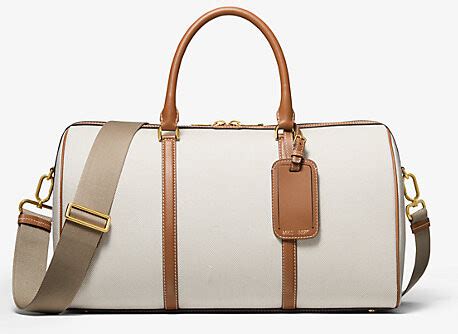 michael kors the bond kleinere tasche|MKC x 007 Bond Cotton Canvas and Leather Weekender Bag.